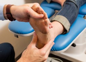 MyFootDr Podiatrist checking a patient's foot