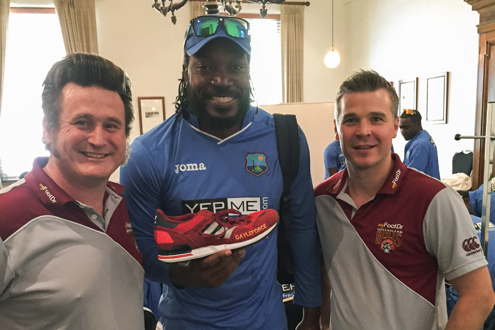 Greg & Darren with West Indies' Chris Gayle holding his Custom Cricket Shoes